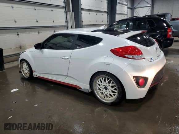 2016 Hyundai Veloster Turbo z VIN KMHTC6AE8GU265894, wystawiony jako Copart lot #85660694 z przebiegiem 117 445 mil mil oraz Szkoda całkowita • Salvage title. Historia ofert i sprzedaży dostępna na DreamBid. Obrazek 2.