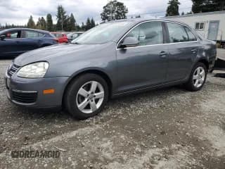 ✅ 2009 Volkswagen Jetta SE • VIN: 3VWRZ71K29M049097 • Lot: 81975105. Listed on Copart with 166,266 mi. Free auction sales archive from the USA and detailed vehicle history report at DreamBid. Image 1.