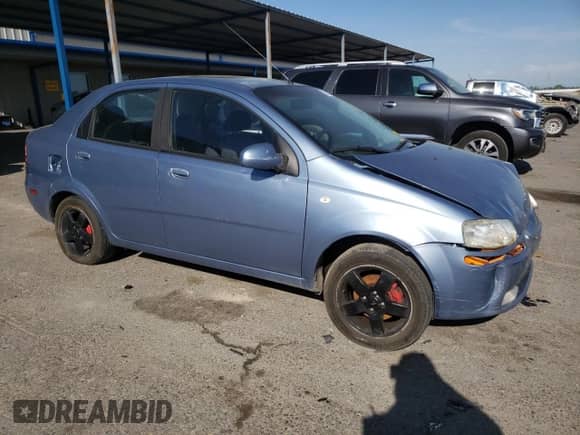2006 Chevrolet Aveo LT with VIN KL1TG56676B528995, listed as a Copart auction lot 53152405 with 212,956 mi miles and Salvage title. Bid and sale history available at DreamBid. Image 4.