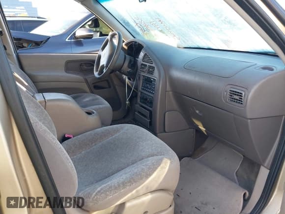 ✅ 1999 Nissan Quest GXE • VIN: 4N2XN11T8XD817151 • Лот: 41845448. Опубликован ранее на IAAI с пробегом 174 750 миль. Бесплатный доступ к архиву аукционных продаж из США и подробный отчёт об истории автомобиля на DreamBid. Изображение 5.