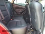 ✅ 2014 Mazda CX-5 Grand Touring • VIN: JM3KE2DY3E0376034 • Lot: 81124925. Wystawiony na Copart z przebiegiem 112 912 mil. Bezpłatny archiwum sprzedaży aukcyjnych z USA i szczegółowy raport historii pojazdu na DreamBid. Zdjęcie 11.