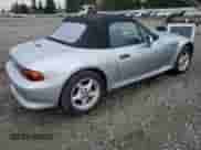 1997 BMW 3 Series Z3 1.9 with VIN 4USCH7325VLB80686, listed as a Copart auction lot 90709565 with 127,908 mi miles and Salvage title. Bid and sale history available at DreamBid. Image 3.