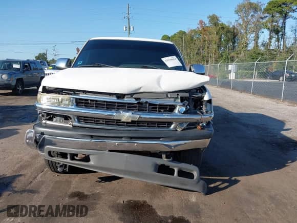 2002 Chevrolet Silverado 1500 LS z VIN 1GCEK19T12E205318, wystawiony jako IAAI lot #43510614 z przebiegiem 158 028 mil mil oraz . Historia ofert i sprzedaży dostępna na DreamBid. Obrazek 6.