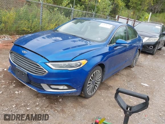 ✅ 2017 Ford Fusion Hybrid Titanium • VIN: 3FA6P0RU4HR388525 • Lot: 43136734. Wystawiony na IAAI z przebiegiem 206 994 mil. Bezpłatny archiwum sprzedaży aukcyjnych z USA i szczegółowy raport historii pojazdu na DreamBid. Zdjęcie 2.