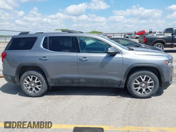 ✅ 2020 GMC Acadia SLT • VIN: 1GKKNULS5LZ221693 • Lot: 42922563. Listed on IAAI with 73,717 mi. Free auction sales archive from the USA and detailed vehicle history report at DreamBid. Image 14.