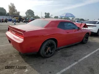 ✅ 2012 Dodge Challenger SXT • VIN: 2C3CDYAG3CH292341 • Lot: 86220874. Wystawiony na Copart z przebiegiem Nie podano. Bezpłatny archiwum sprzedaży aukcyjnych z USA i szczegółowy raport historii pojazdu na DreamBid. Zdjęcie 3.