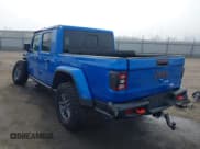 ✅ 2024 Jeep Gladiator Mojave X • VIN: 1C6JJTEG5RL121313 • Lot: 41013599. Listed on IAAI with 2,952 mi. Free auction sales archive from the USA and detailed vehicle history report at DreamBid. Image 3.