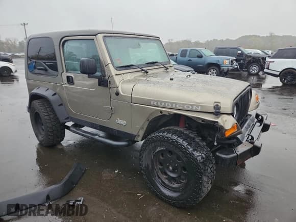 ✅ 2004 Jeep Wrangler Rubicon • VIN: 1J4FA69S14P800280 • Lot: 82372155. Wystawiony na Copart z przebiegiem 38 663 mil. Bezpłatny archiwum sprzedaży aukcyjnych z USA i szczegółowy raport historii pojazdu na DreamBid. Zdjęcie 4.