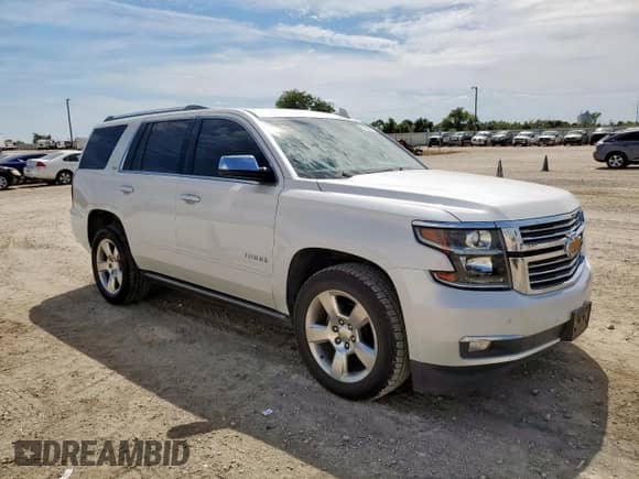 2016 Chevrolet Tahoe LTZ с VIN 1GNSKCKC6GR264493, выставлен на аукционе Copart как лот 84283015 с пробегом 142 412 миль миль и Списание • Salvage title. История ставок и продаж доступна на DreamBid. Изображение 4.