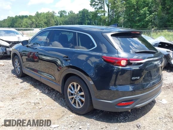 ✅ 2019 Mazda CX-9 Touring • VIN: JM3TCACY9K0332122 • Lot: 42704764. Wystawiony na IAAI z przebiegiem 53 315 mil. Bezpłatny archiwum sprzedaży aukcyjnych z USA i szczegółowy raport historii pojazdu na DreamBid. Zdjęcie 3.