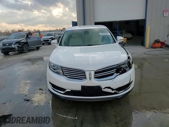 ✅ 2016 Lincoln MKX Select • VIN: 2LMTJ6KRXGBL26325 • Лот: 93252645. Опубликован ранее на Copart с пробегом 144 105 миль. Бесплатный доступ к архиву аукционных продаж из США и подробный отчёт об истории автомобиля на DreamBid. Изображение 13.
