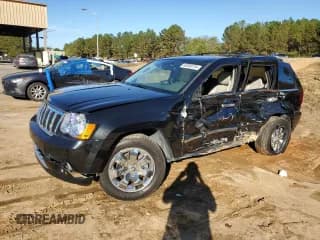 ✅ 2009 Jeep Grand Cherokee • VIN: 1J8HR68T19C550936 • Lot: 80090724. Listed on Copart with 113,543 mi. Free auction sales archive from the USA and detailed vehicle history report at DreamBid. Image 1.