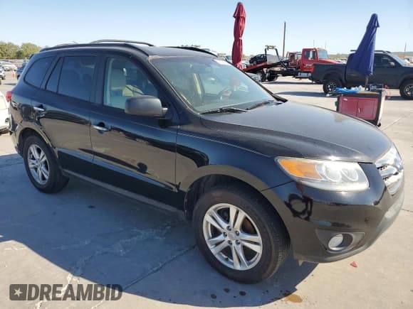 ✅ 2012 Hyundai Santa Fe Limited • VIN: 5XYZK4AG3CG157279 • Lot: 76894754. Listed on Copart with 127,061 mi. Free auction sales archive from the USA and detailed vehicle history report at DreamBid. Image 4.
