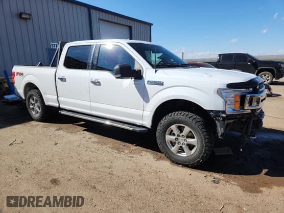✅ 2018 Ford F-150 XL • VIN: 1FTFW1EG8JKF40867 • Lot: 87422545. Listed on Copart with 115,071 mi. Free auction sales archive from the USA and detailed vehicle history report at DreamBid. Image 4.