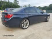 ✅ 2015 BMW 7 Series 750i • VIN: WBAYA8C51FG197764 • Lot: 67095554. Listed on Copart with 167,458 mi. Free auction sales archive from the USA and detailed vehicle history report at DreamBid. Image 3.