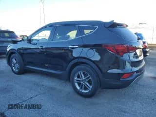 ✅ 2018 Hyundai Santa Fe 2.4L • VIN: 5NMZUDLB0JH061981 • Лот: 79767683. Опубликован ранее на Copart с пробегом 26 987 миль. Бесплатный доступ к архиву аукционных продаж из США и подробный отчёт об истории автомобиля на DreamBid. Изображение 2.