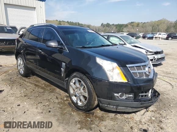 ✅ 2012 Cadillac SRX Performance Collection • VIN: 3GYFNBE31CS509239 • Lot: 47958424. Listed on Copart with 171,067 mi. Free auction sales archive from the USA and detailed vehicle history report at DreamBid. Image 4.
