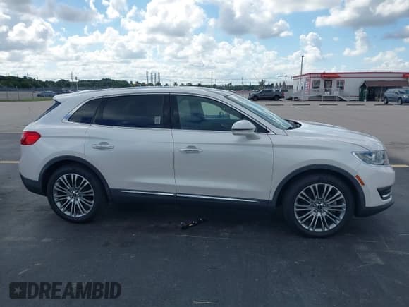 ✅ 2018 Lincoln MKX Reserve • VIN: 2LMPJ6LR0JBL26437 • Lot: 43506847. Listed on IAAI with 24,939 mi. Free auction sales archive from the USA and detailed vehicle history report at DreamBid. Image 13.