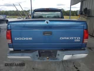 2004 Dodge Dakota SLT z VIN 1D7GL42N14S676687, wystawiony jako Copart lot #72150124 z przebiegiem 162 913 mil mil oraz Szkoda całkowita • Salvage title. Historia ofert i sprzedaży dostępna na DreamBid. Obrazek 6.