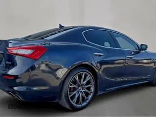 ✅ 2019 Maserati Ghibli S Q4 GranLusso • VIN: ZAM57YTL0K1319168 • Лот: 85443925. Опубликован ранее на Copart с пробегом 119 092 миль. Бесплатный доступ к архиву аукционных продаж из США и подробный отчёт об истории автомобиля на DreamBid. Изображение 3.