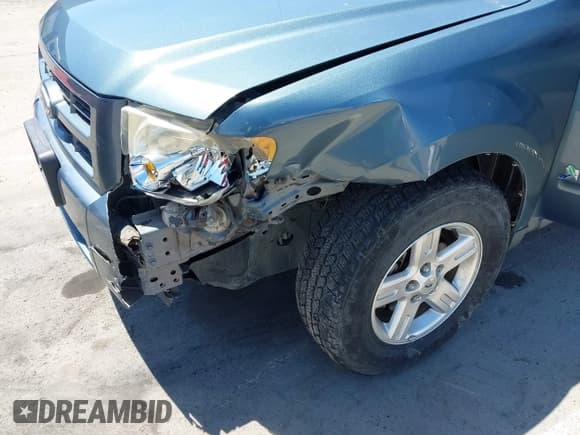 ✅ 2011 Ford Escape Hybrid • VIN: 1FMCU4K30BKC54584 • Лот: 42131257. Опубликован ранее на IAAI с пробегом 107 905 миль. Бесплатный доступ к архиву аукционных продаж из США и подробный отчёт об истории автомобиля на DreamBid. Изображение 6.