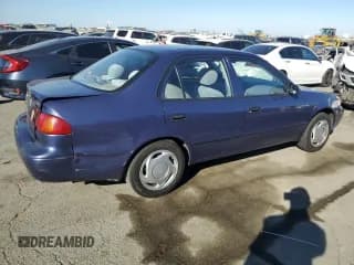 ✅ 1999 Toyota Corolla VE • VIN: 1NXBR12E4XZ300894 • Lot: 73604234. Wystawiony na Copart z przebiegiem 153 787 mil. Bezpłatny archiwum sprzedaży aukcyjnych z USA i szczegółowy raport historii pojazdu na DreamBid. Zdjęcie 3.