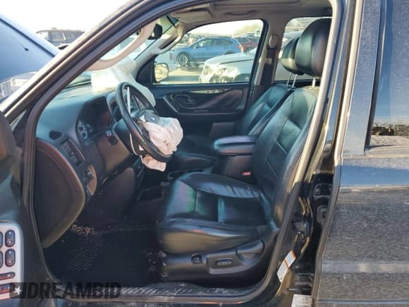 ✅ 2004 Ford Escape Limited • VIN: 1FMCU04184KA70257 • Lot: 89130575. Listed on Copart with 186,430 mi. Free auction sales archive from the USA and detailed vehicle history report at DreamBid. Image 7.