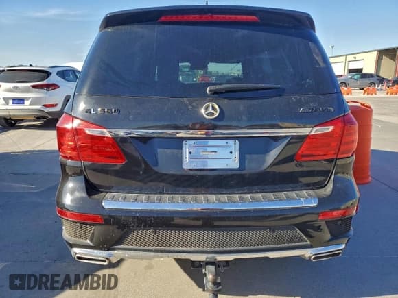 ✅ 2014 Mercedes-Benz GL 550 • VIN: 4JGDF7DE5EA350171 • Lot: 92241225. Listed on Copart with 115,625 mi. Free auction sales archive from the USA and detailed vehicle history report at DreamBid. Image 6.