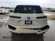 ✅ 2024 BMW iX xDrive50 • VIN: WB523CF04RCN04826 • Lot: 80787045. Listed on Copart with 58,223 mi. Free auction sales archive from the USA and detailed vehicle history report at DreamBid. Image 6.