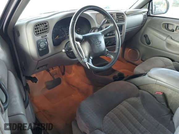 2001 Chevrolet S-10 LS с VIN 1GCCS19W718180469, выставлен на аукционе Copart как лот 73985274 с пробегом 76 639 миль миль и Списание • Salvage title. История ставок и продаж доступна на DreamBid. Изображение 8.