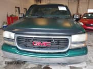 ✅ 1999 GMC Sierra 1500 SLE • VIN: 2GTEC19T0X1527504 • Lot: 43012004. Listed on IAAI with Not provided. Free auction sales archive from the USA and detailed vehicle history report at DreamBid. Image 6.