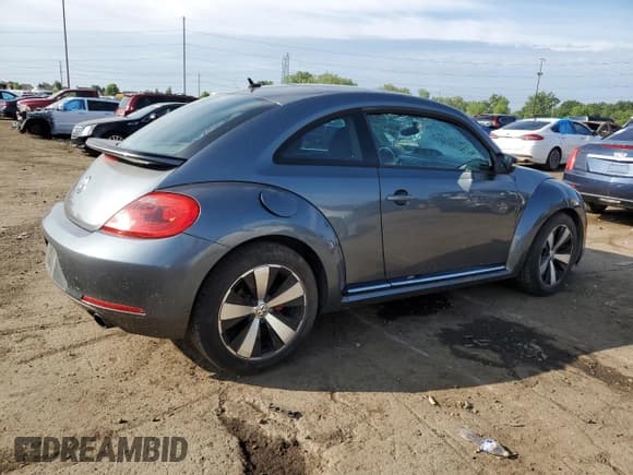 ✅ 2013 Volkswagen Beetle Turbo • VIN: 3VWV67AT9DM602000 • Лот: 60961775. Опубликован ранее на Copart с пробегом 88 188 миль. Бесплатный доступ к архиву аукционных продаж из США и подробный отчёт об истории автомобиля на DreamBid. Изображение 3.
