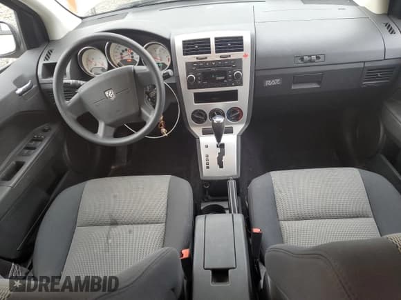 ✅ 2009 Dodge Caliber SXT • VIN: 1B3HB48AX9D259703 • Лот: 80551064. Опубликован ранее на Copart с пробегом 128 818 миль. Бесплатный доступ к архиву аукционных продаж из США и подробный отчёт об истории автомобиля на DreamBid. Изображение 8.