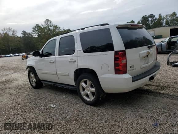 2007 Chevrolet Tahoe LTZ with VIN 1GNFC13007R183609, listed as a Copart auction lot 81827535 with 233,431 mi miles and Salvage title. Bid and sale history available at DreamBid. Image 2.
