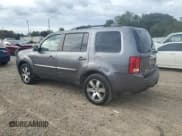 ✅ 2014 Honda Pilot Touring • VIN: 5FNYF3H96EB006433 • Lot: 70204195. Listed on Copart with 188,583 mi. Free auction sales archive from the USA and detailed vehicle history report at DreamBid. Image 2.