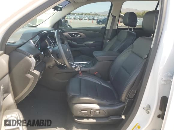 ✅ 2018 Chevrolet Traverse Premier • VIN: 1GNERKKW7JJ129378 • Lot: 66762234. Wystawiony na Copart z przebiegiem 63 933 mil. Bezpłatny archiwum sprzedaży aukcyjnych z USA i szczegółowy raport historii pojazdu na DreamBid. Zdjęcie 7.