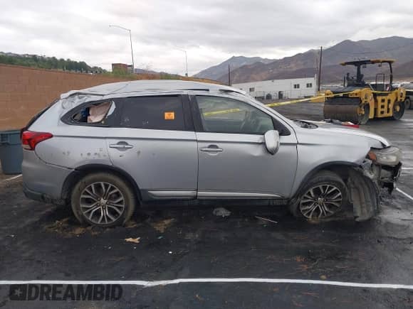 2016 Mitsubishi Outlander SE with VIN JA4AD3A37GZ001441, listed as a IAAI auction lot 43227608 with 134,397 mi miles and . Bid and sale history available at DreamBid. Image 12.