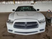 ✅ 2013 Dodge Charger SE • VIN: 2C3CDXBG1DH628305 • Lot: 82633525. Wystawiony na Copart z przebiegiem 177 611 mil. Bezpłatny archiwum sprzedaży aukcyjnych z USA i szczegółowy raport historii pojazdu na DreamBid. Zdjęcie 5.