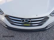 ✅ 2014 Hyundai Santa Fe • VIN: 5XYZUDLB8EG223579 • Lot: 43887430. Listed on IAAI with 181,075 mi. Free auction sales archive from the USA and detailed vehicle history report at DreamBid. Image 12.