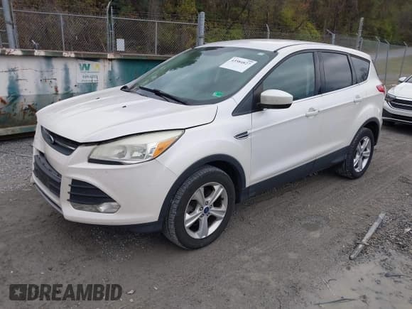 ✅ 2015 Ford Escape SE • VIN: 1FMCU9GX5FUB16820 • Lot: 43584827. Listed on IAAI with 131,101 mi. Free auction sales archive from the USA and detailed vehicle history report at DreamBid. Image 2.