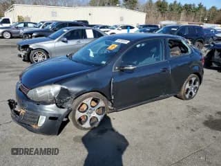 ✅ 2012 Volkswagen Golf GTI w/Conv & Sunroof • VIN: WVWEV7AJ4CW125785 • Lot: 49780335. Listed on Copart with 125,837 mi. Free auction sales archive from the USA and detailed vehicle history report at DreamBid. Image 1.