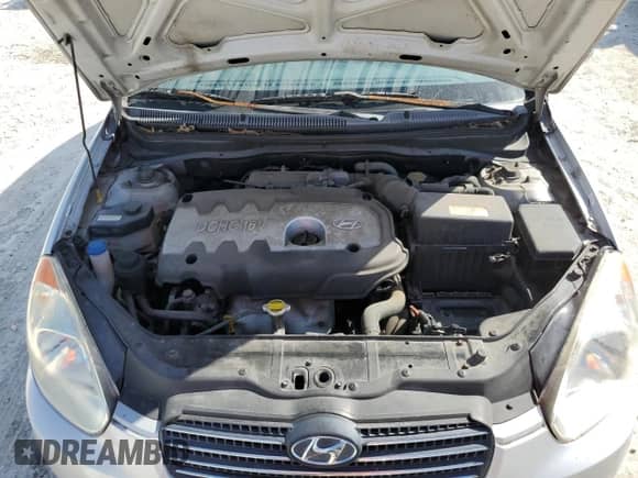 2007 Hyundai Accent GL z VIN KMHCN45C77U073194, wystawiony jako Copart lot #42955445 z przebiegiem 248 364 mil mil oraz Nie do naprawy • Non repairable. Historia ofert i sprzedaży dostępna na DreamBid. Obrazek 12.