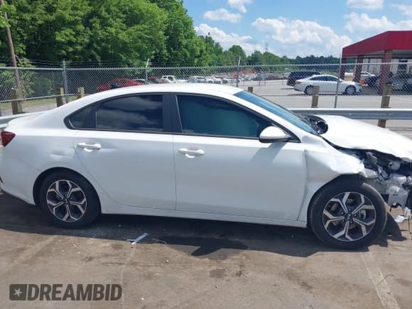 ✅ 2021 Kia Forte LXS • VIN: 3KPF24AD8ME394275 • Lot: 42322720. Listed on IAAI with 62,658 mi. Free auction sales archive from the USA and detailed vehicle history report at DreamBid. Image 13.