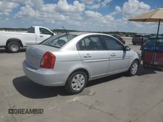 ✅ 2009 Hyundai Accent Auto GLS • VIN: KMHCN46C59U297954 • Лот: 67725644. Опубликован ранее на Copart с пробегом 104 862 миль. Бесплатный доступ к архиву аукционных продаж из США и подробный отчёт об истории автомобиля на DreamBid. Изображение 3.