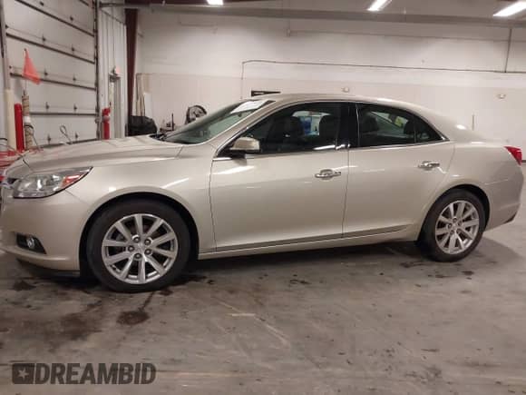 2014 Chevrolet Malibu LTZ with VIN 1G11H5SL0EF286219, listed as a IAAI auction lot 43479851 with 123,219 mi miles and . Bid and sale history available at DreamBid. Image 14.