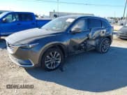 ✅ 2019 Mazda CX-9 Grand Touring • VIN: JM3TCADY0K0322996 • Lot: 43435898. Wystawiony na IAAI z przebiegiem 66 764 mil. Bezpłatny archiwum sprzedaży aukcyjnych z USA i szczegółowy raport historii pojazdu na DreamBid. Zdjęcie 2.