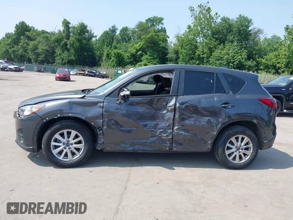 ✅ 2016 Mazda CX-5 Sport • VIN: JM3KE2BE0G0857015 • Lot: 42471734. Listed on IAAI with 81,401 mi. Free auction sales archive from the USA and detailed vehicle history report at DreamBid. Image 15.