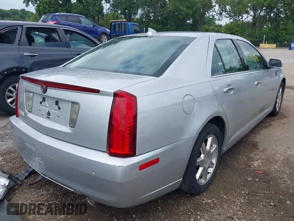 ✅ 2011 Cadillac STS RWD • VIN: 1G6DW6ED8B0127731 • Лот: 42778186. Опубликован ранее на IAAI с пробегом 103 192 миль. Бесплатный доступ к архиву аукционных продаж из США и подробный отчёт об истории автомобиля на DreamBid. Изображение 4.
