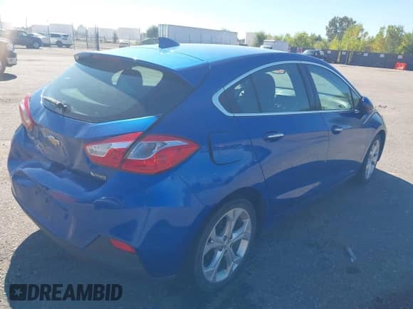 2017 Chevrolet Cruze Premier z VIN 3G1BF6SM6HS570740, wystawiony jako IAAI lot #43311391 z przebiegiem 77 877 mil mil oraz . Historia ofert i sprzedaży dostępna na DreamBid. Obrazek 4.