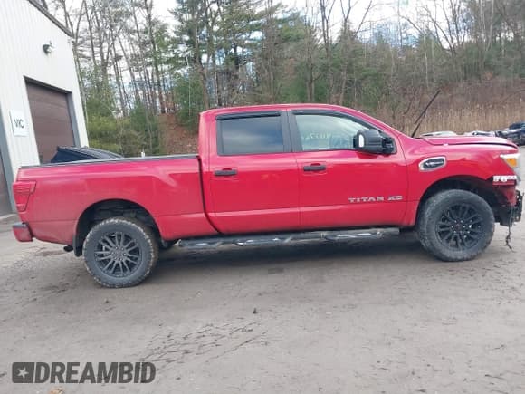 ✅ 2022 Nissan Titan Platinum Reserve • VIN: 1N6AA1FB5NN103034 • Lot: 41177605. Listed on IAAI with 71,657 mi. Free auction sales archive from the USA and detailed vehicle history report at DreamBid. Image 13.
